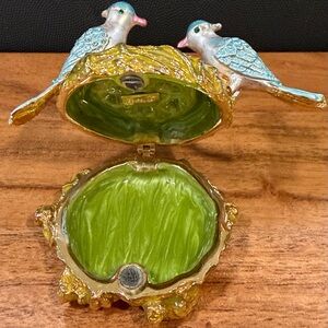 Birds nest trinket box with bejeweled birds and eggs
